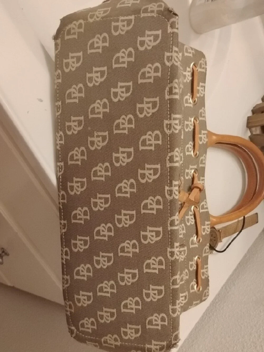 Dooney & Bourke Beige/Tan Signature Logo Tote with Tassel